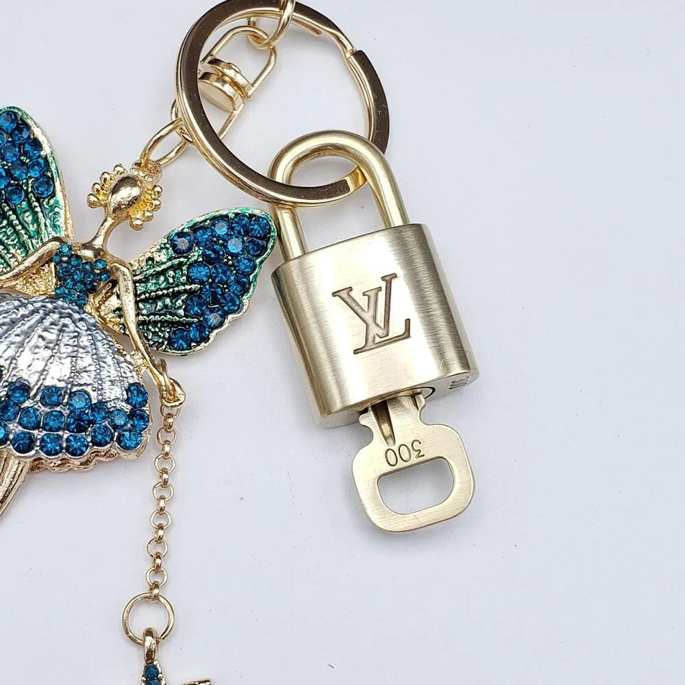Authentic Louis Vuitton Lock & Key with Unbranded Fairy Charm, Keychain